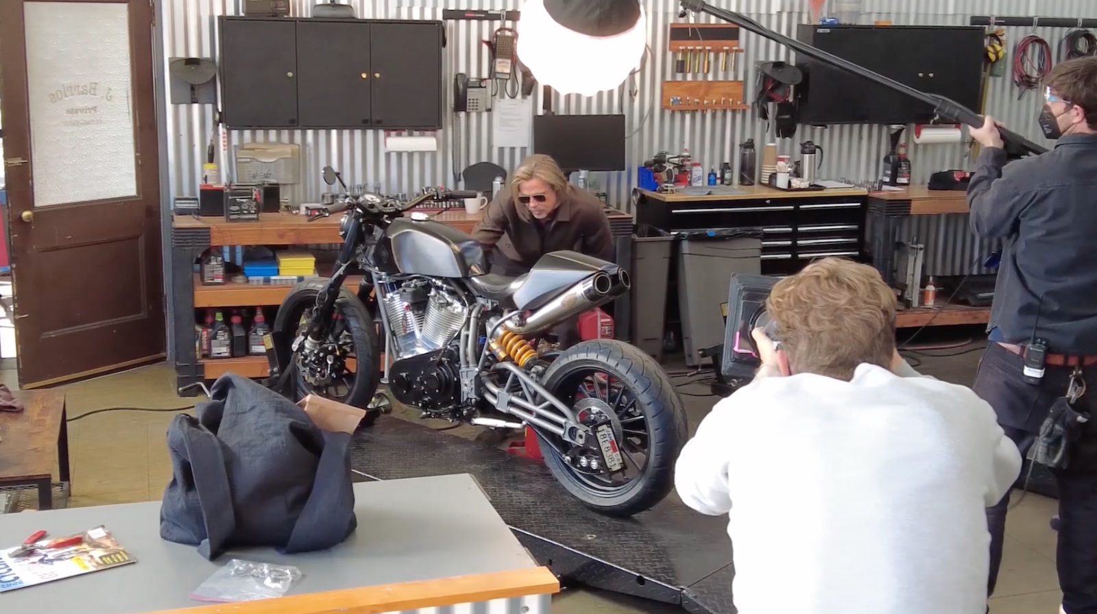 Brad Pitt on the bike in the workshop set
